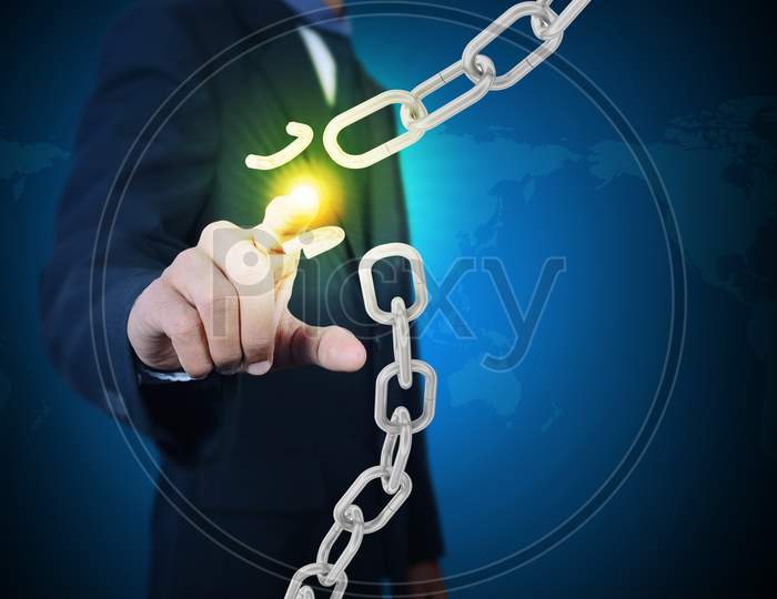 Business Man With Broken Chain