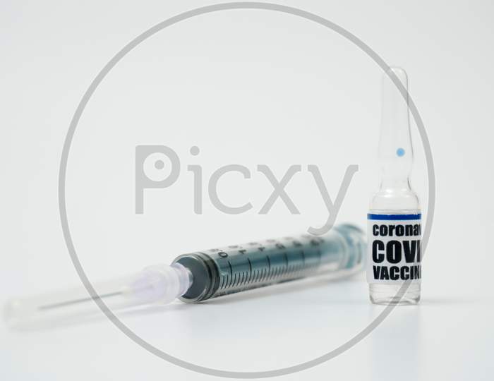Covid-19 Corona Virus 2019-Ncov Vaccine Syringe Injection Vials Medicine Drug Ampoule Bottle. Vaccination, Immunization, Treatment To Cure Covid-19 Corona Virus Infection. Medical Concept.