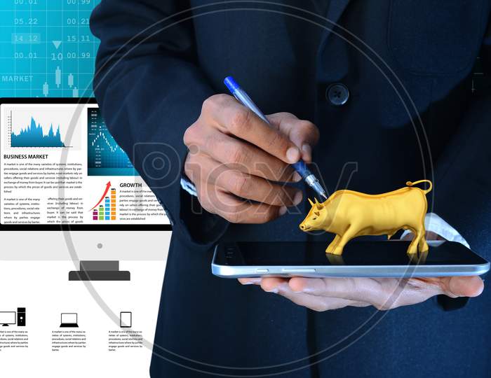 Man Hand Showing The Stock Market Bull
