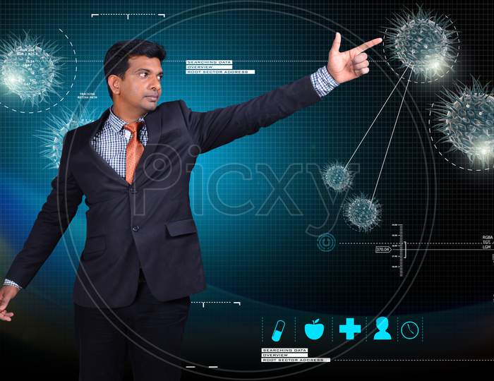 Young Indian Man pointing towards a Moving Virus