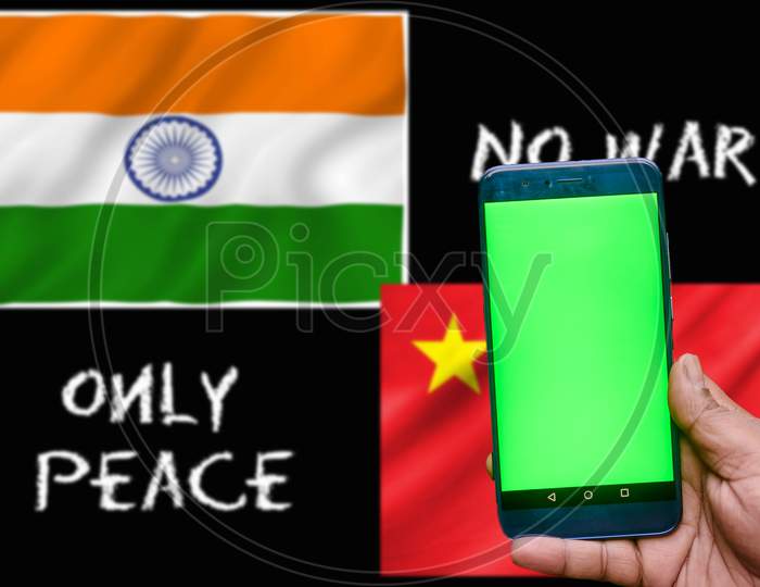 No war only peace written on the background with hand holding mobile with green screen in front