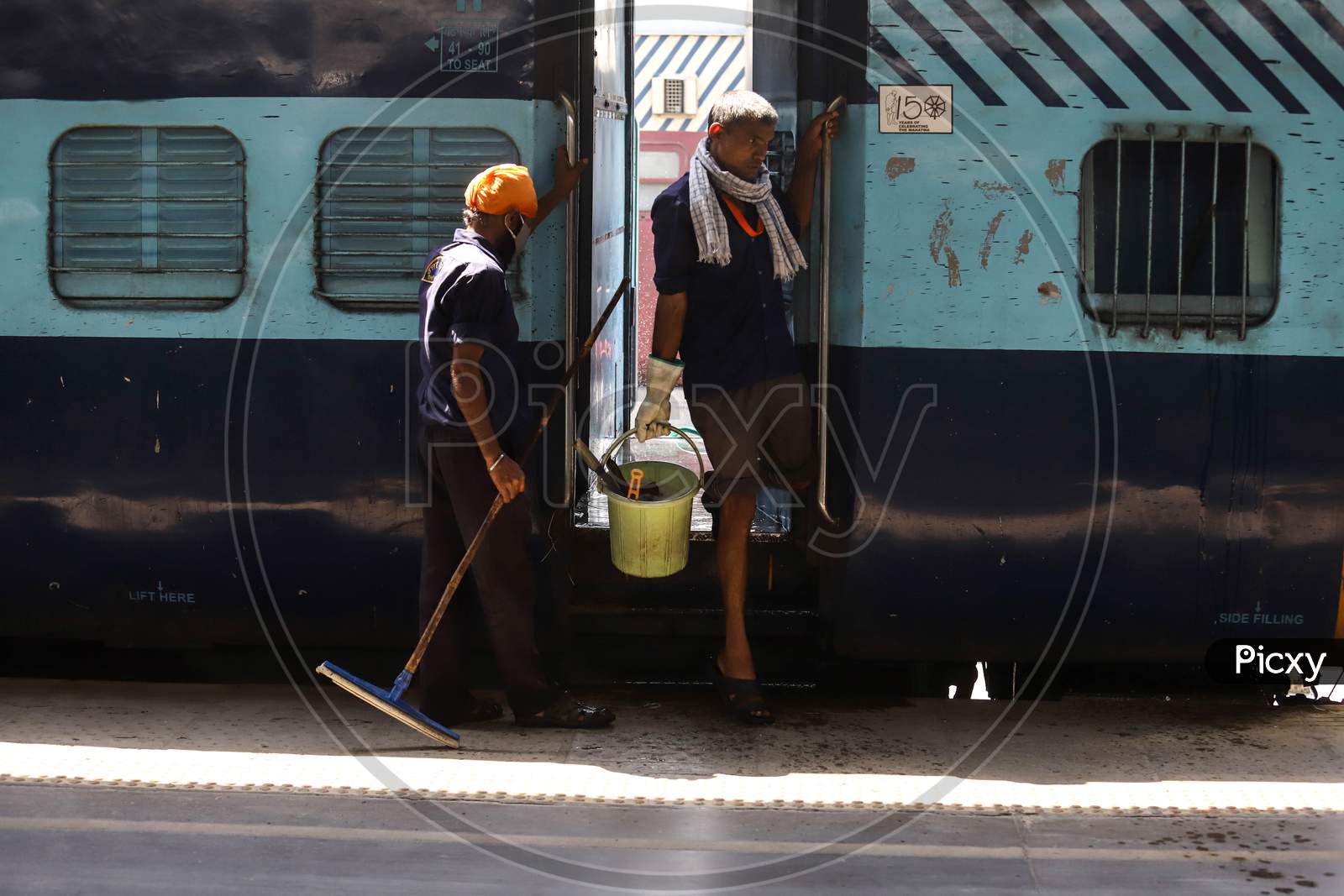 Workers Prepare A Train Coach As A Temporary Covid-19 Isolation Facility At Anand Vihar Railway Station, In New Delhi On June 17, 2020.