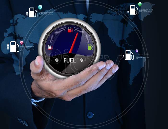 Close Up shot of a Person's Hand with Fuel Indicator