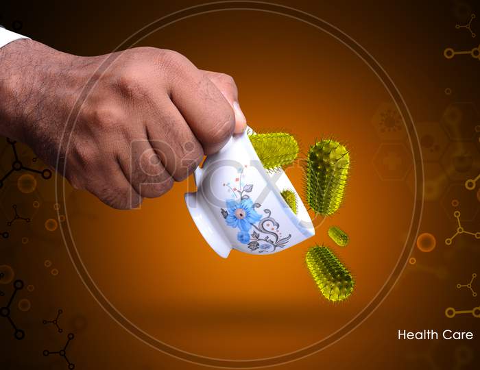 Smart Hand Showing Virus In Tea Cup