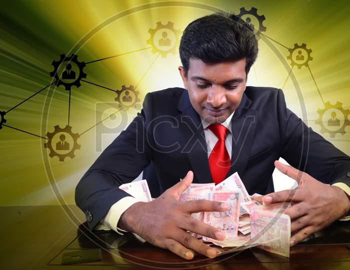Businessman With Lot Of Money