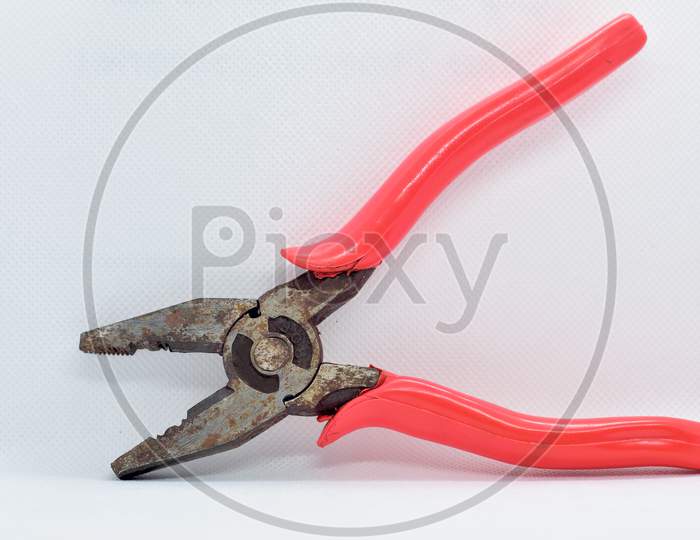 Old Used Iron Cutting Pliers Tongs Isolated On White Background