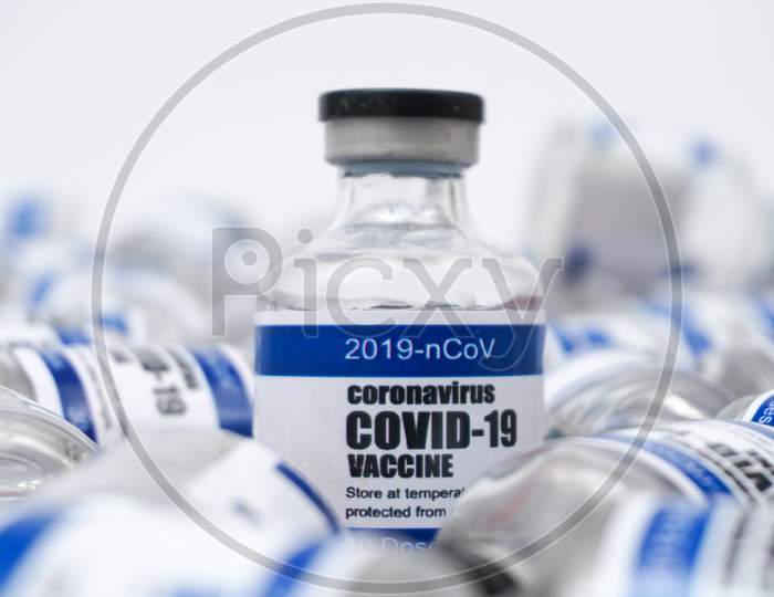 Covid-19 Corona Virus 2019-Ncov Vaccine Injection Vials Medicine Drug Bottles. Vaccination, Immunization, Testing, Treatment To Cure Covid-19 Corona Virus Infection. Healthcare And Medical Concept.