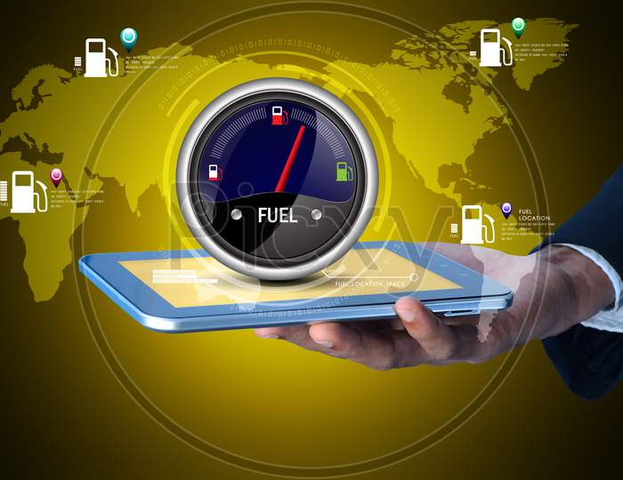 Close up shot of a person's hand holding iPad or Tablet with a Fuel Indicator