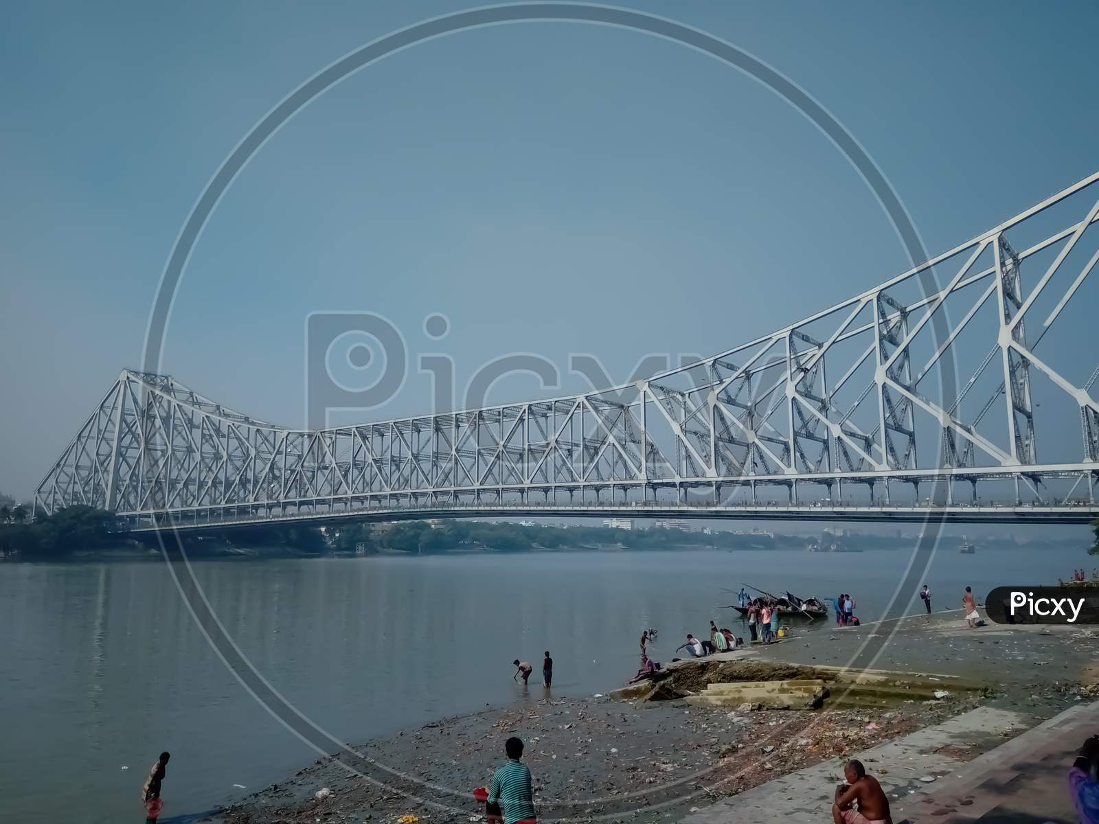 Famous Howrah bridge on Hooghly river in kolkata India tourist attraction