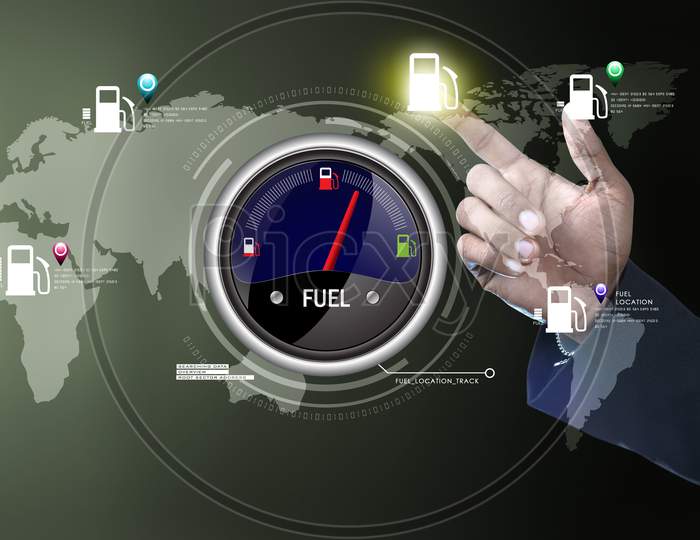 Close up shot of A man pointing to a Fuel Indicator