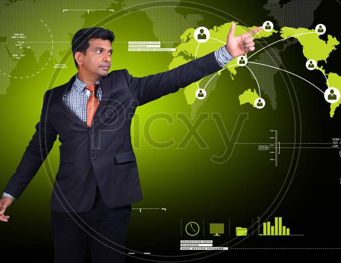 Young Indian Man person pointing towards a Network
