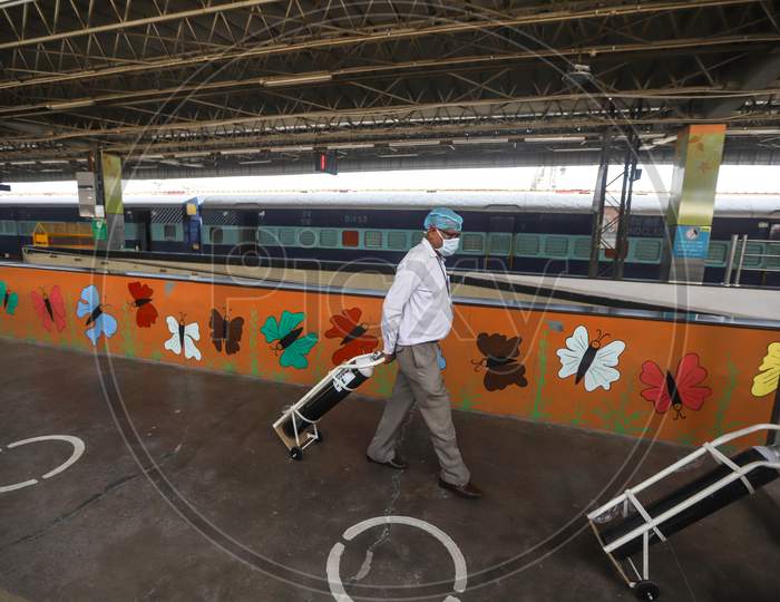 Workers Carry Oxygen Cylinders Inside Anand Vihar Railway Station, Where Train Coaches Are Being Temporarily Converted Into Covid-19 Isolation Facilities, In New Delhi, India On June 17, 2020.