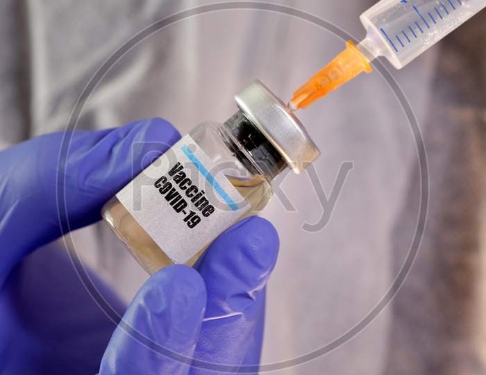 Covid-19 vaccine in hand