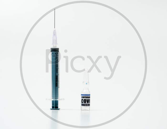 Covid-19 Ampoule Corona Virus 2019-Ncov Vaccine Syringe Injection Vials Medicine Drug Bottle. Vaccination, Immunization, Treatment To Cure Covid-19 Corona Virus Infection. Medical Concept.