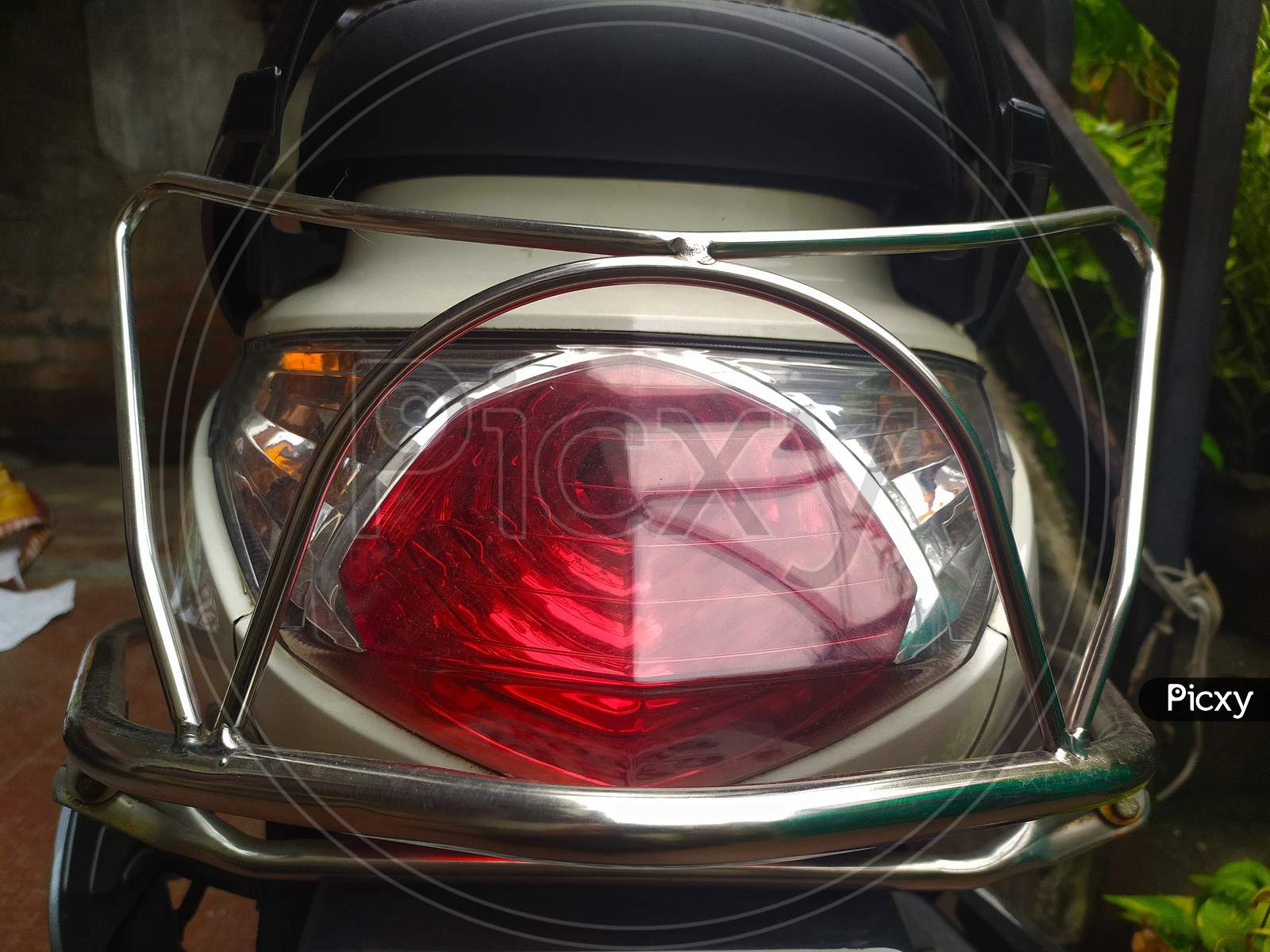 red color indicator light of two wheeler vehicle, backside