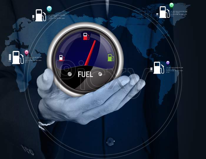 Close up shot of Person's Hands holding a Fuel Indicator