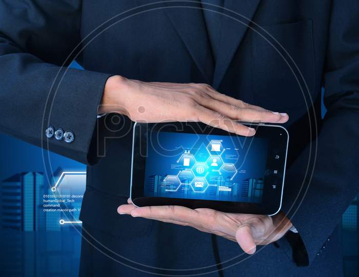 Man Showing Networking On Mobile Phone In Color Background