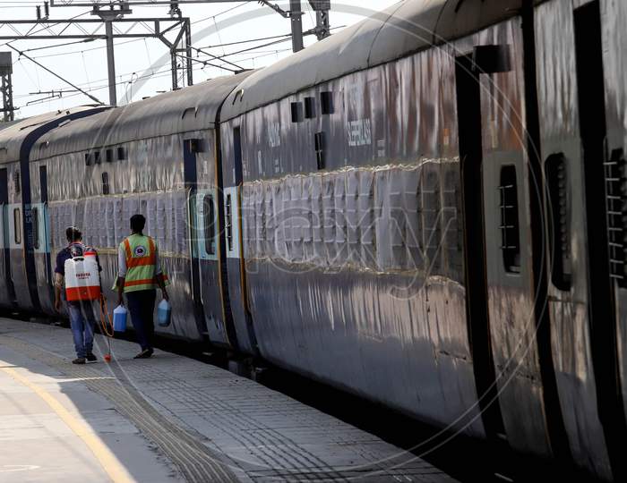 Workers Disinfect A Train Coach Which was Temporarily Converted into An Isolation Ward For Coronavirus Patients, At Anand Vihar Railway Station, On June 17, 2020 In New Delhi, India.