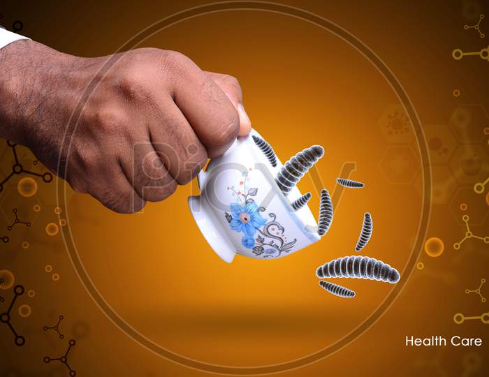 Smart Hand Showing Virus In Tea Cup