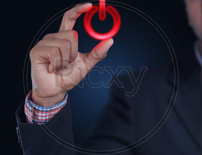 Man Showing The Power Button