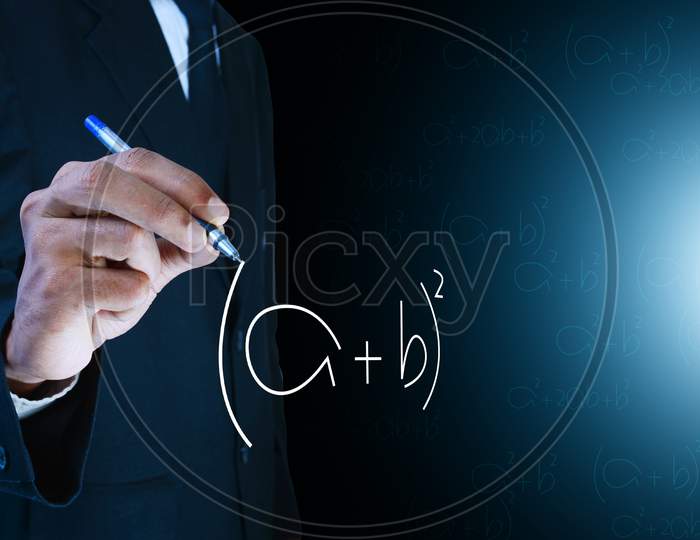 Man Writing The Mathematical Equations