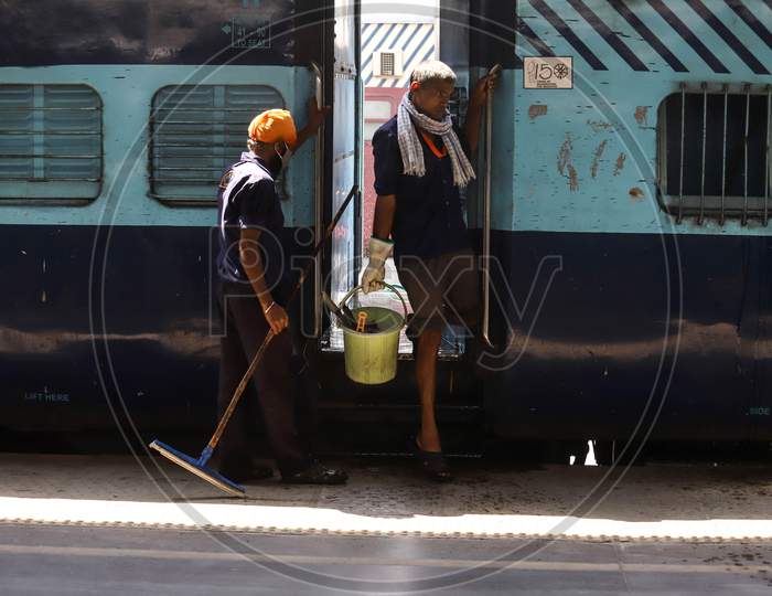Workers Prepare A Train Coach As A Temporary Covid-19 Isolation Facility At Anand Vihar Railway Station, In New Delhi On June 17, 2020.