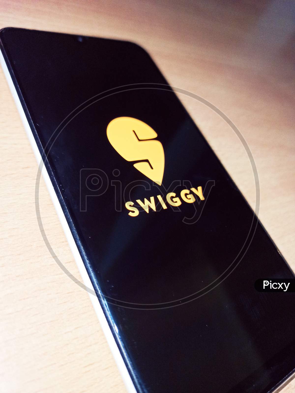 Swiggy logo on Mobile phone