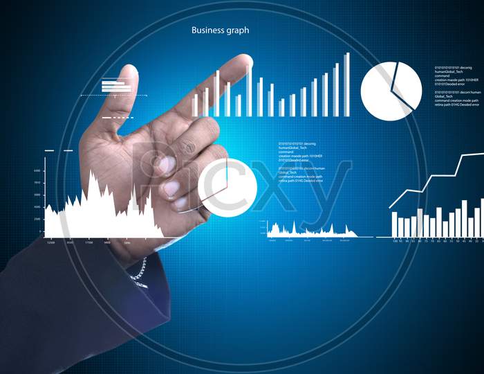 Close up shot of a Person's Hands pointing towards Growth Bars and Pie Charts