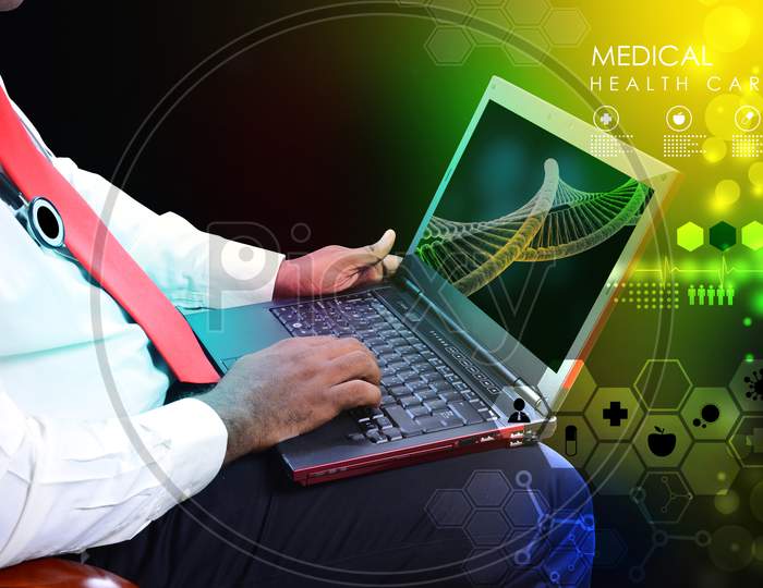 Doctor With Stethoscope And Laptop