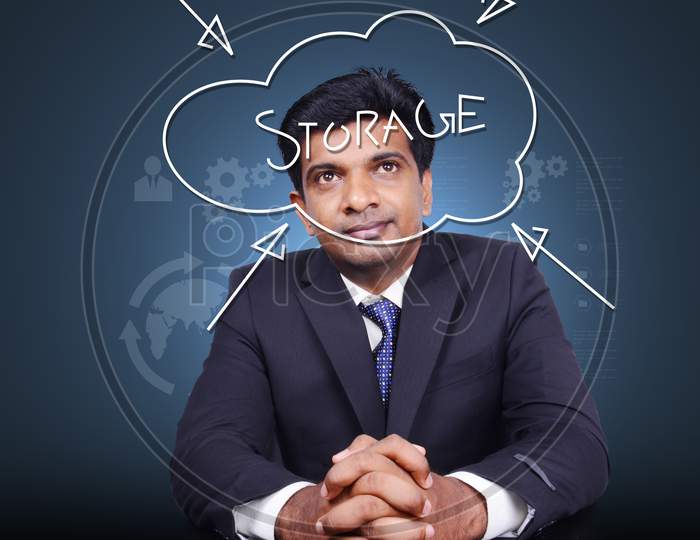 Man Thinking Cloud Storage Concept
