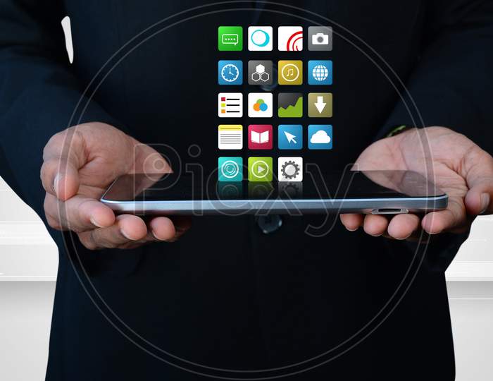 Man Showing  The  App Icons In Digital Tablet