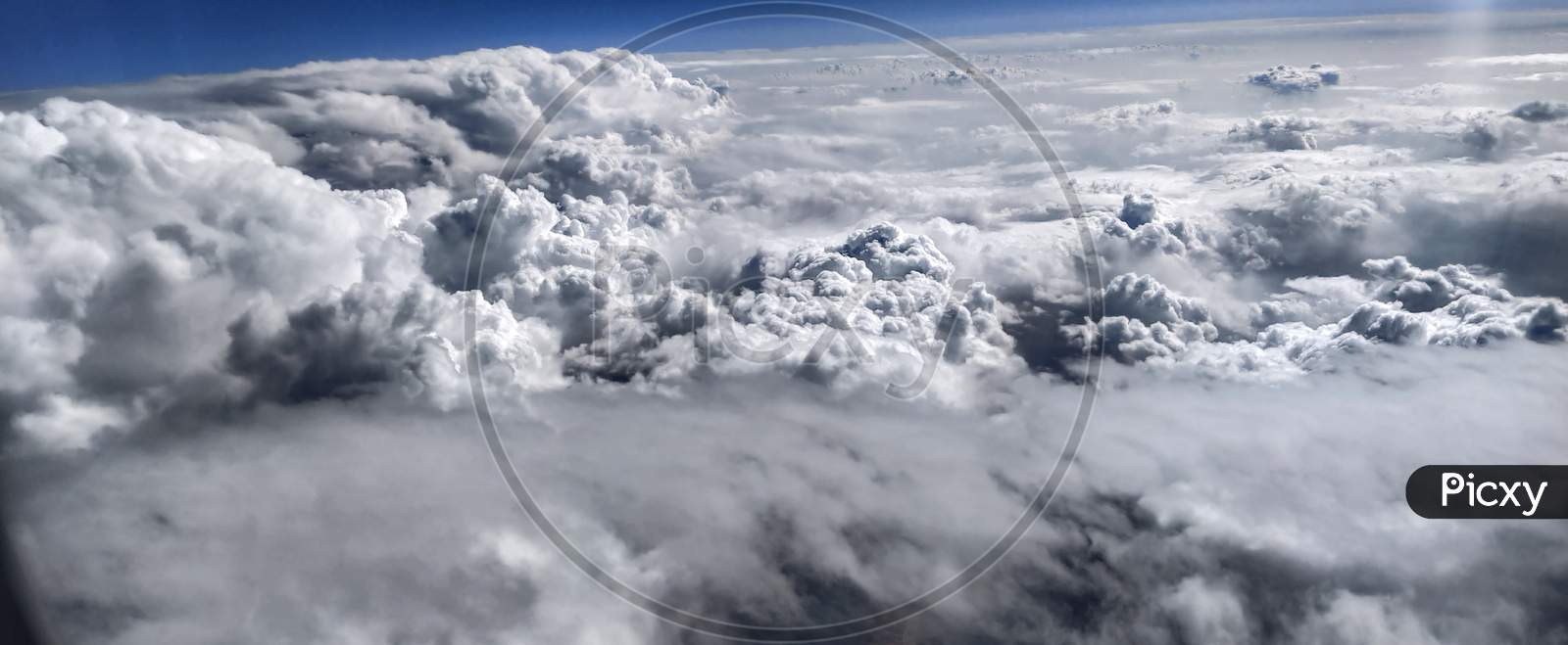 Image Taken Of Earth Covered With The Cloud From Airplane.