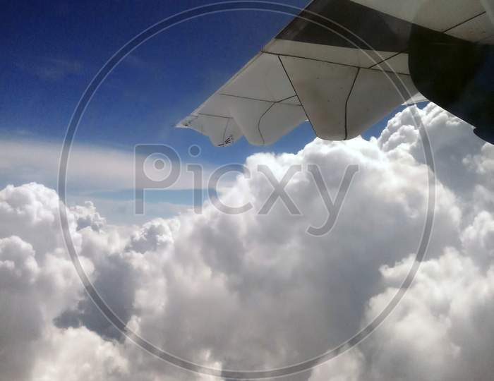 View of Blue sky and white cloud from an airplane