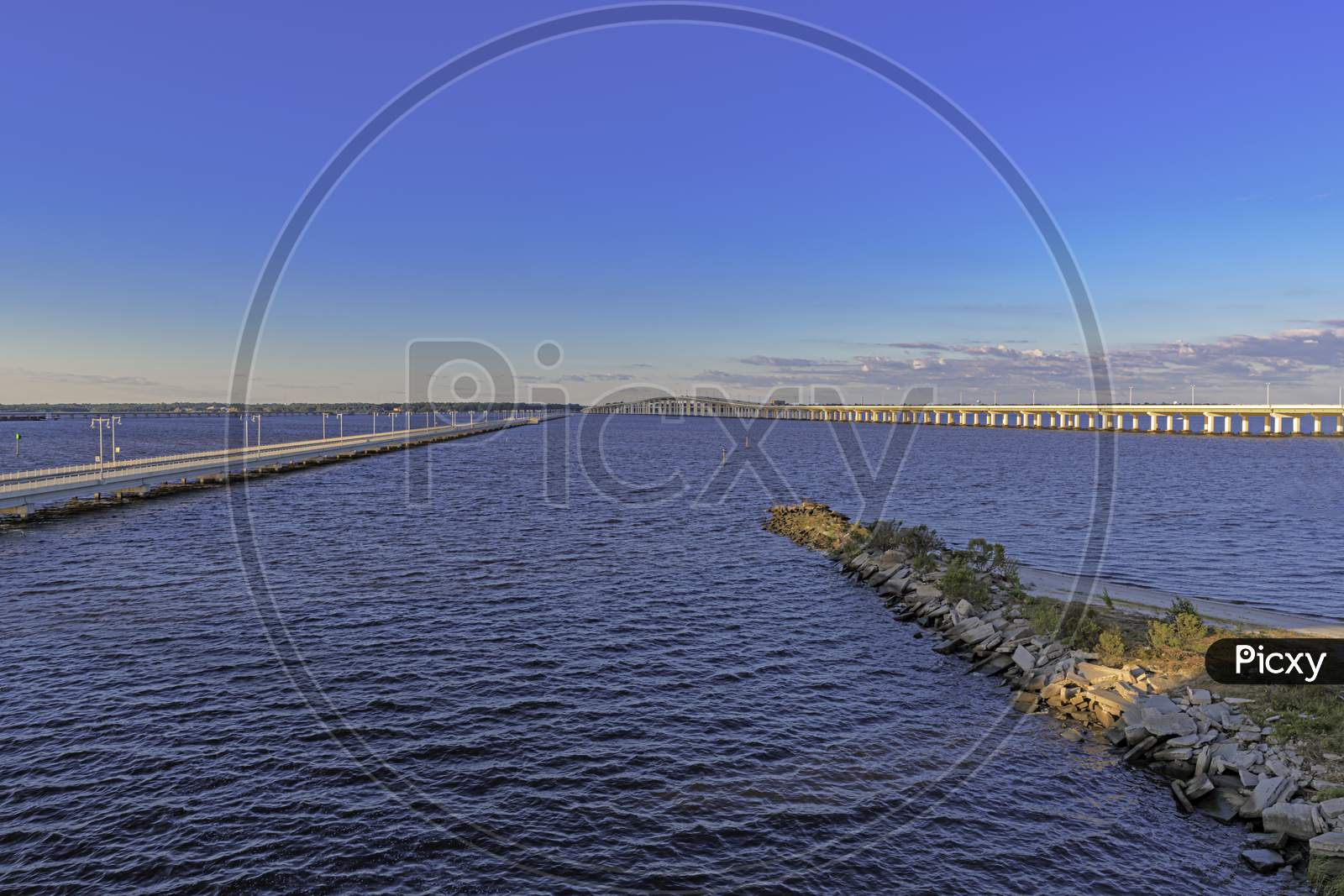 The Ocean Springs Bay Bridge, Fishing Pier And Train Bridge