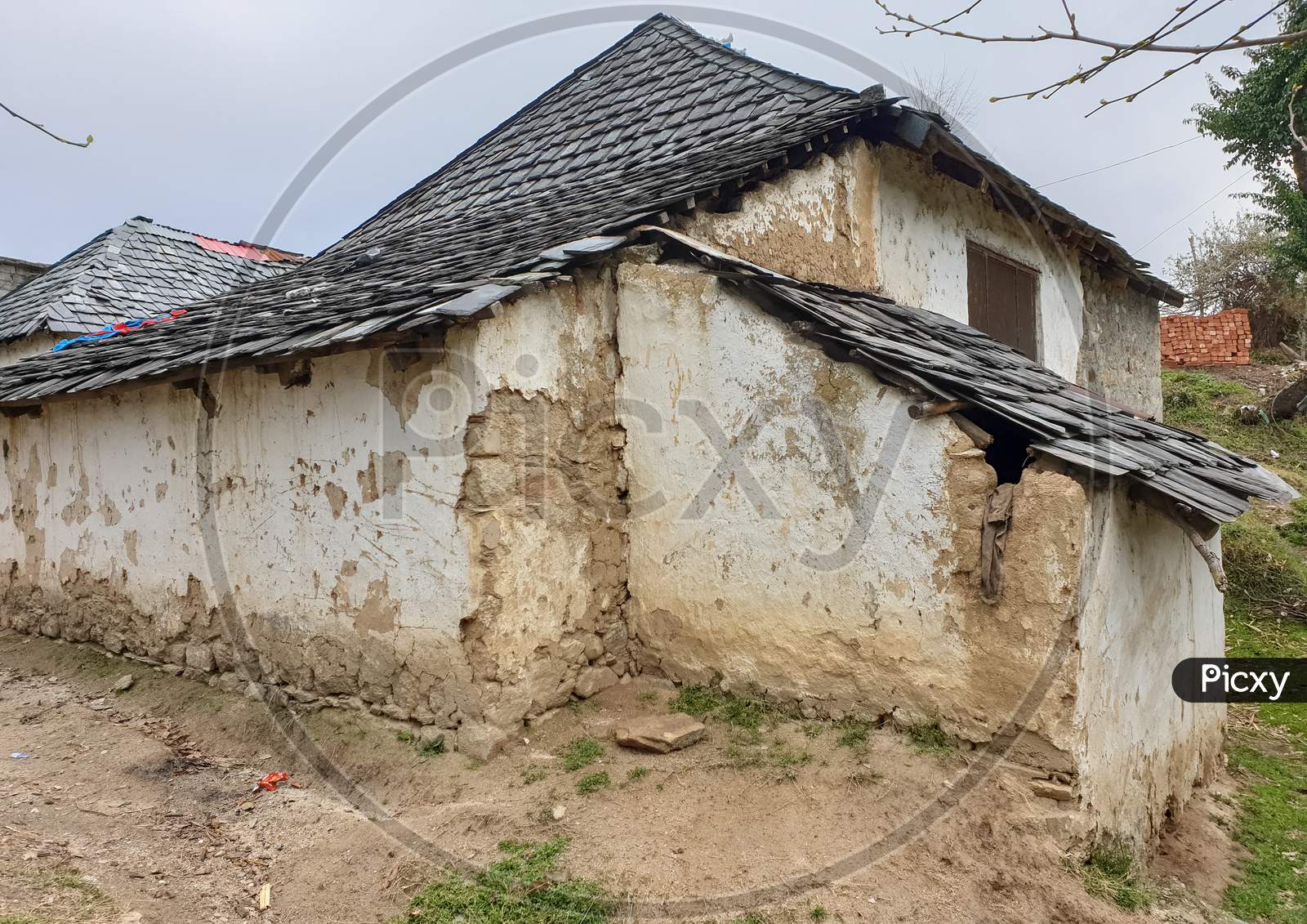 Photo of broken old Indian slate house