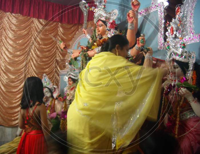 offering puja to Maa Durga during Durga Puja