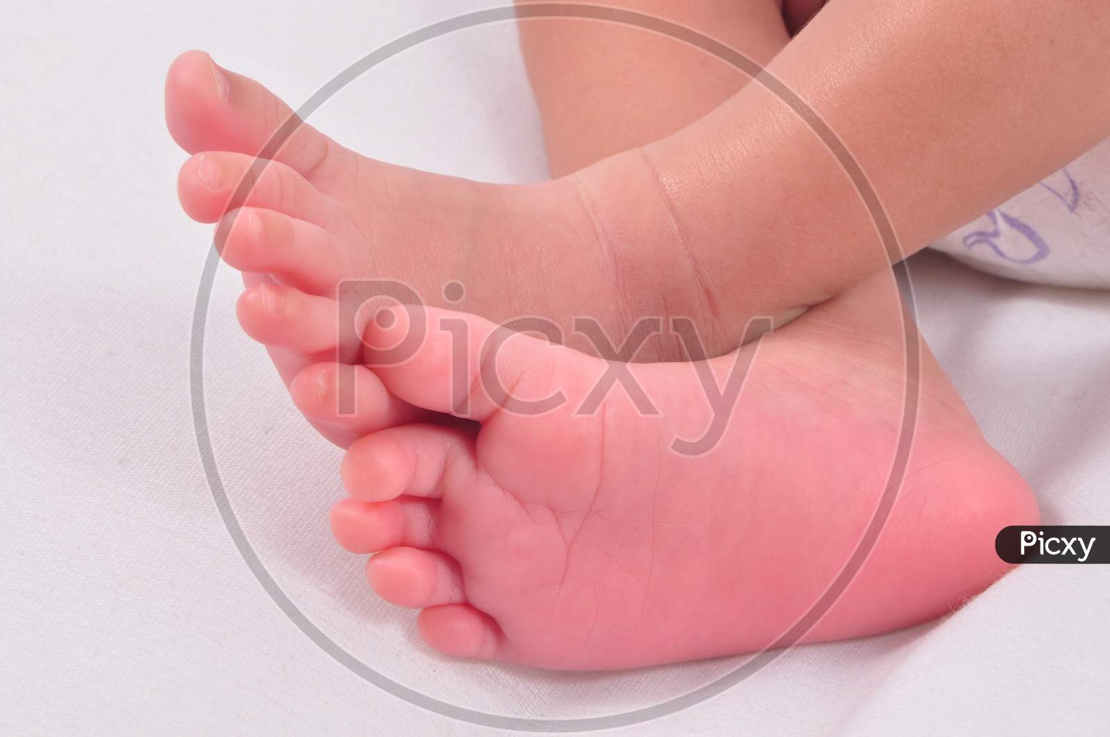 Baby Feet Crossed While Sleeping.