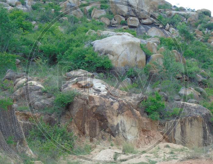 Hills and rocks on village