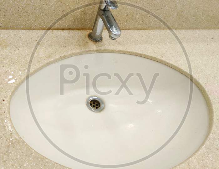 Simple classic Hygienic wash basin in bathroom marble finishing.