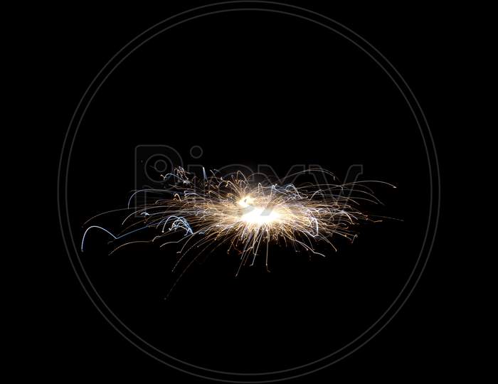 Firecracker Sparkle In Black Isolated Background