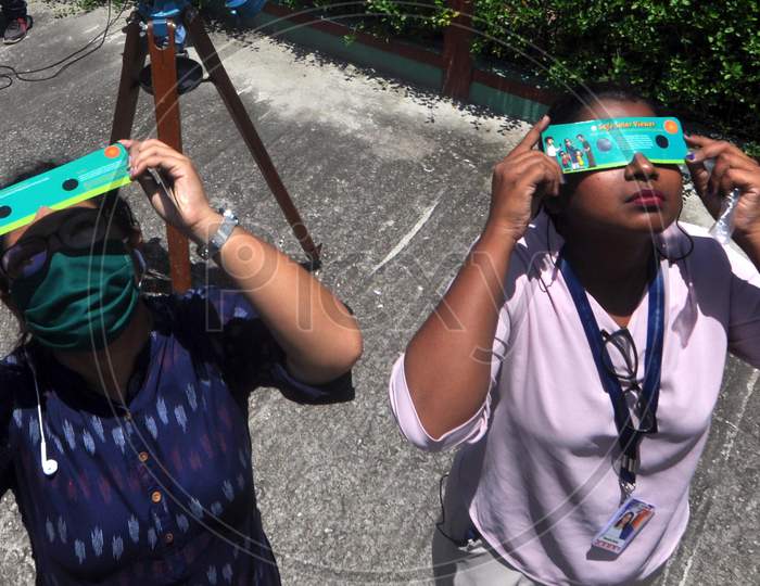 Girls View Solar Eclipse Using A Filter, In Guwahati, Sunday, June 21, 2020.