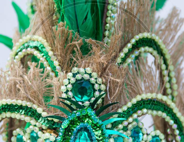 Detail Of The Helmet With Feathers And Embroidery For The Carnival
