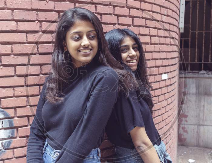 Friends Forever. Two Cute Lovely Girl Friends Posing With Smile