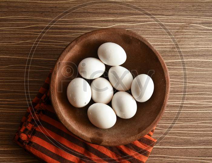 chicken eggs on the table. Farm products, natural eggs.