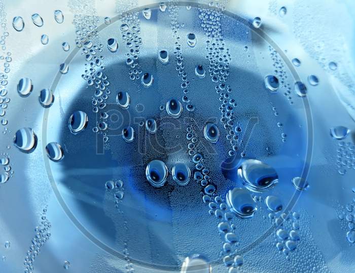 Beautiful Blue Dew Drops In Glass