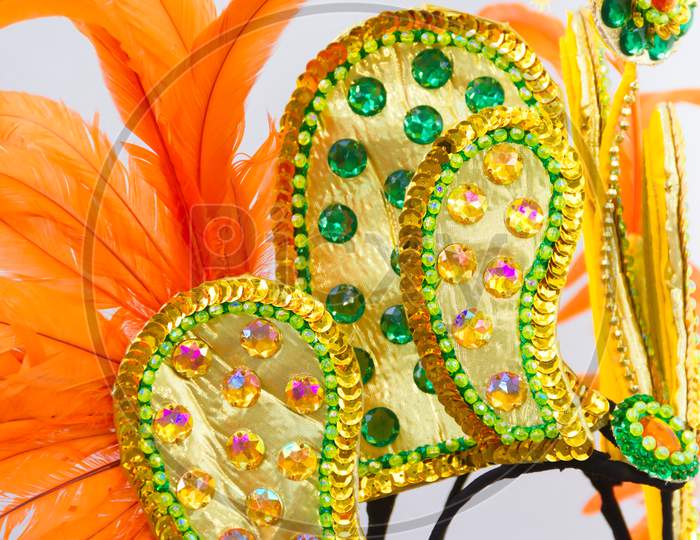 Helmet Decorated With Bright Stones And Feathers For Carnival