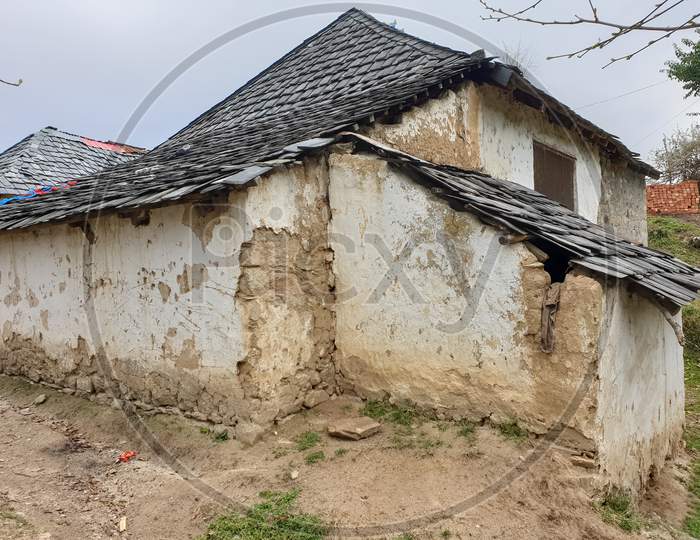 Photo of broken old Indian slate house