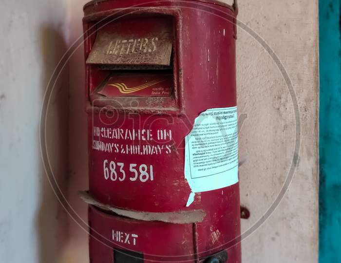 Indian Post Box Hung To A Wall In Front Of India Post Office. Indian Letterbox.