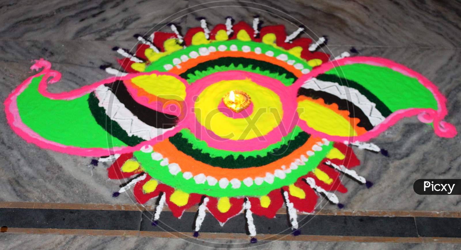 hand made colorful rangoli art during Diwali