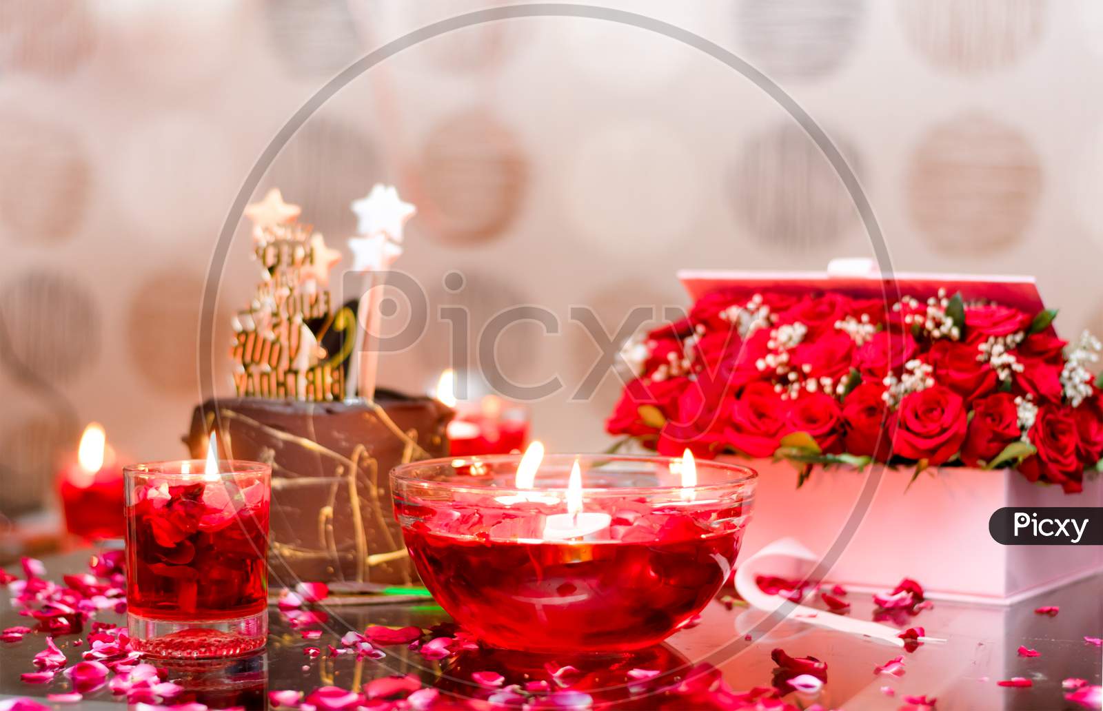 Decoration Of Red Flowers And Candles For Celebration.
